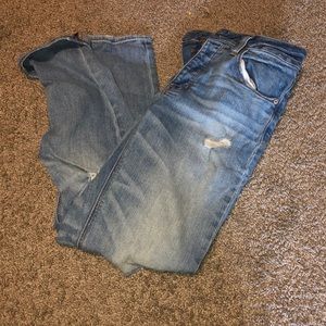 distressed boyfriend jeans. basically new